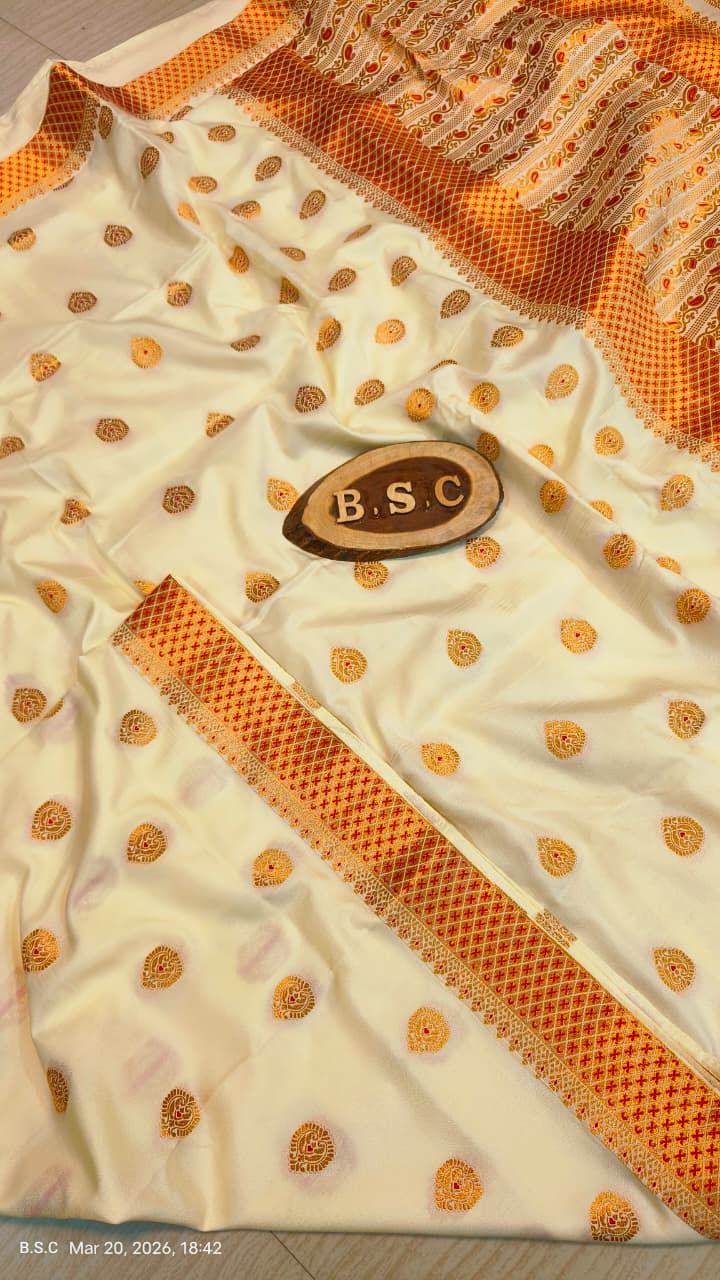 Graceful Ivory Assam Silk Saree with Vermilion Red & Gold Handwork Border with Blouse Piece