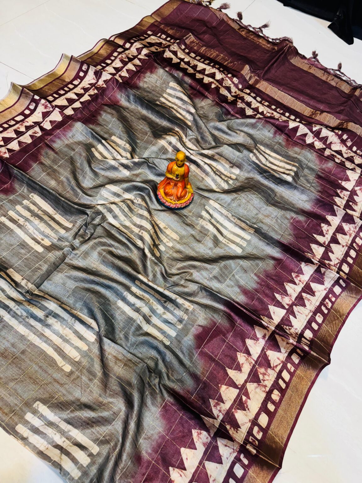 Handcrafted Grey & Aubergine Modal Silk Saree with Geometric Off-White Motifs and Gold Accents & Blouse Piece