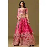 SEASONS-RANI PINK CLASSIC BRIDAL LEHENGA SET WITH ALL OVER PATTERNED HAND EMBROIDERY PAIRED WITH A MATCHING DUPATTA AND FLORAL EMBROIDERED DETAILS.
