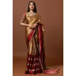 SEASONS-GOLD AND RED CLASSIC SAREE SET PAIRED WITH A MATCHING HAND EMBROIDERED BLOUSE AND MIRROR DETAILS.
